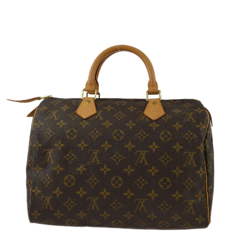 Louis Vuitton Twist bags with a contrast - colored interior for visual interestLouis Vuitton 1998 Monogram Speedy 30 Handbag M41526