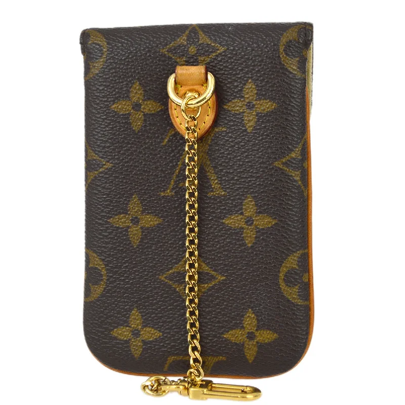 Louis Vuitton Twist bags with a crystal - embellished LV - turnlockLouis Vuitton 2009 Monogram Etui Telephone MM Pouch Bag M66546 Small Good