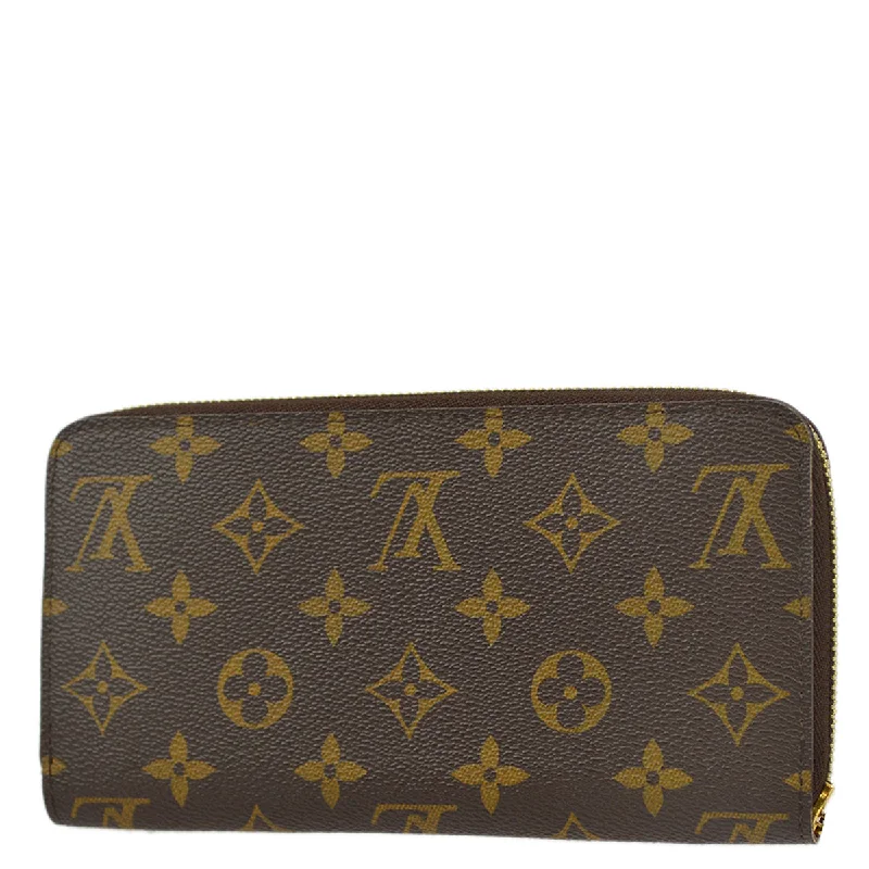 Louis Vuitton Alma bags featuring the signature top - handle designLouis Vuitton 2009 Monogram Zippy Wallet M62581