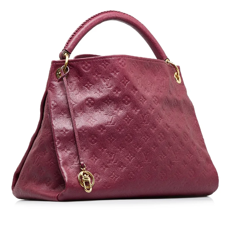 Louis Vuitton Twist bags with the iconic LV - turnlock closureLouis Vuitton Artsy MM Red Monogram Empreinte