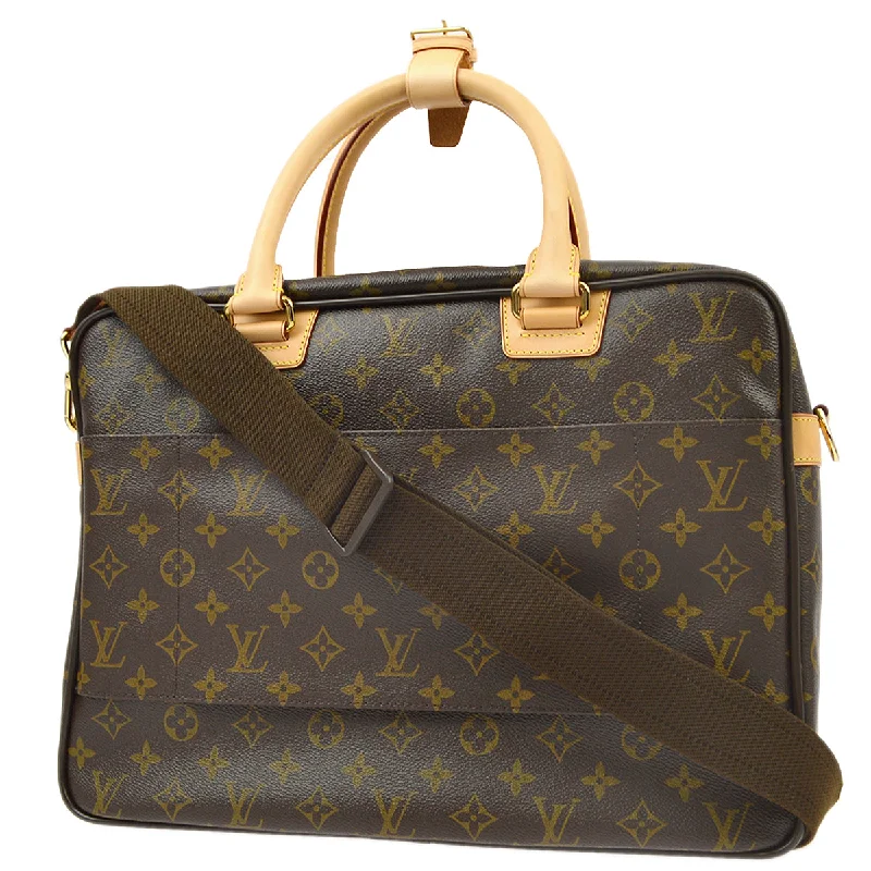 Louis Vuitton bags with a snap - button closure and a decorative charm for styleLouis Vuitton 2009 Monogram Icare 2way Shoulder Handbag M23252