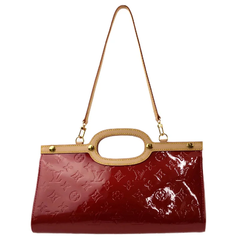 Louis Vuitton Alma bags featuring the signature top - handle designLouis Vuitton 2007 Red Monogram Vernis Roxbury Drive Handbag M91987