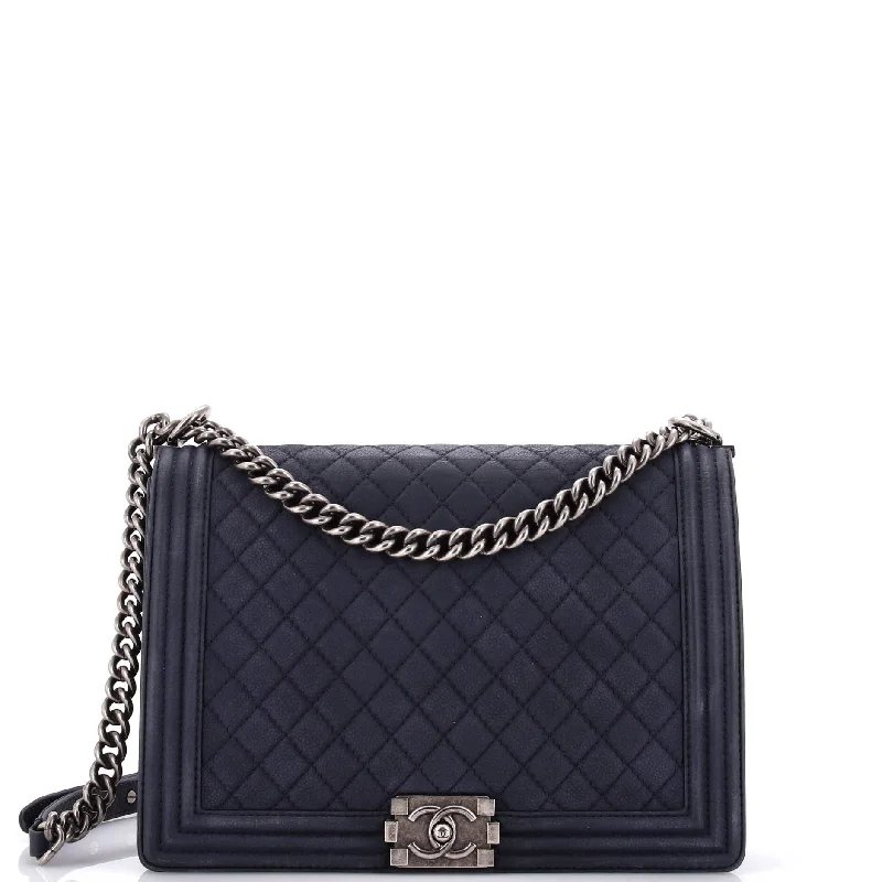 Christian Dior handbags with a snap - button closure and a decorative buckleBoy Flap Bag Quilted Matte Caviar Large